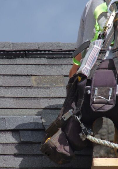 Inspecting damage on Roof